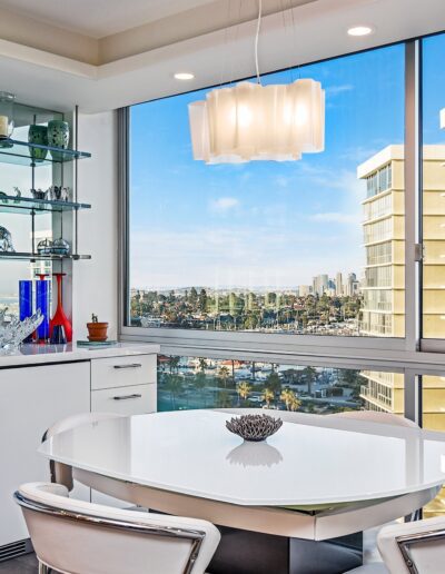 A dining room with a view of the city.