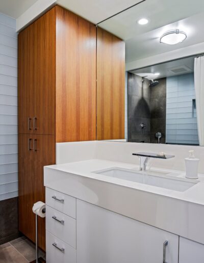 A white bathroom with a toilet and sink.